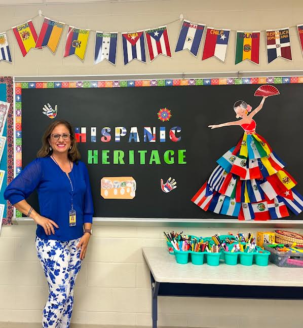 Sra. Reema Sanchez in her newly decorated classroom.