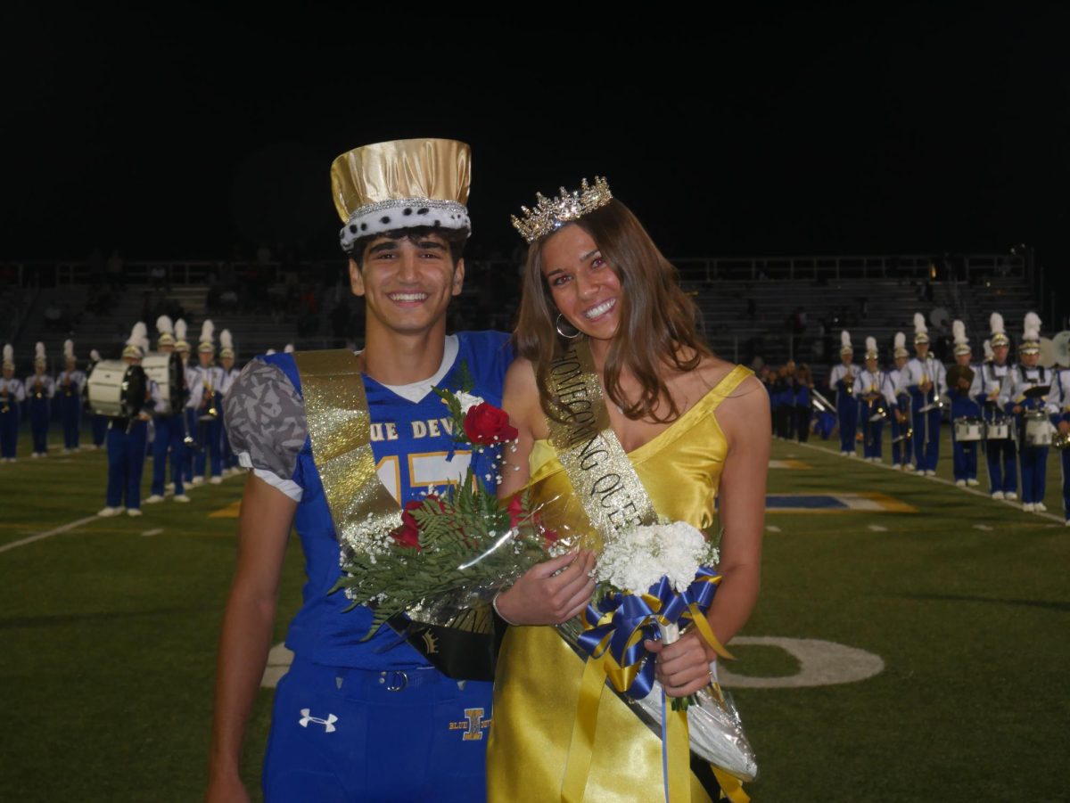 Jamie Panichi and Giada Spisak named King and Queen at halftime