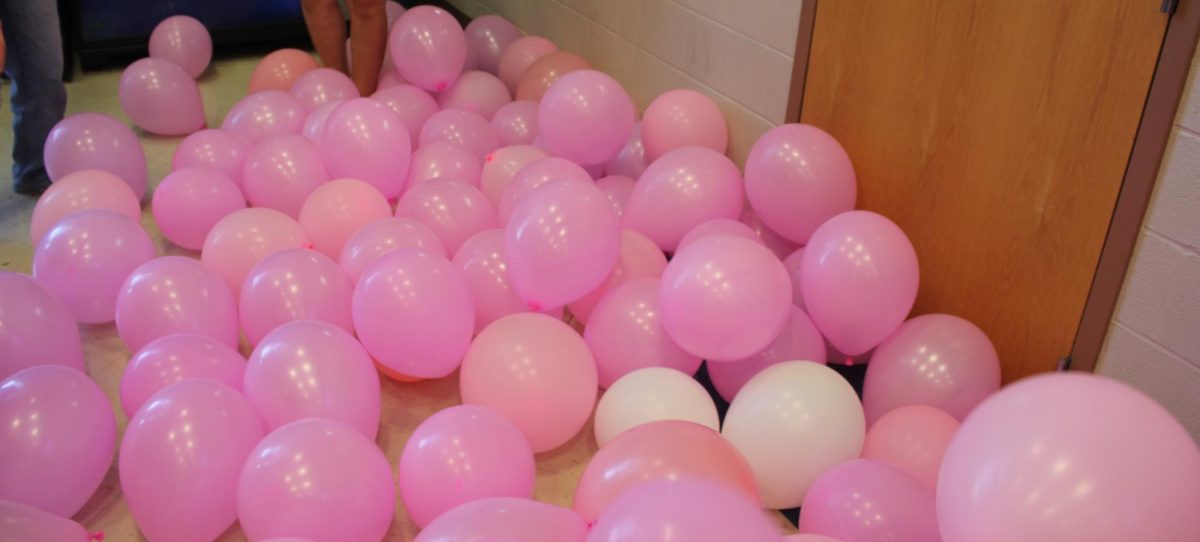 Stockpile of balloons used to decorate the senior hallway