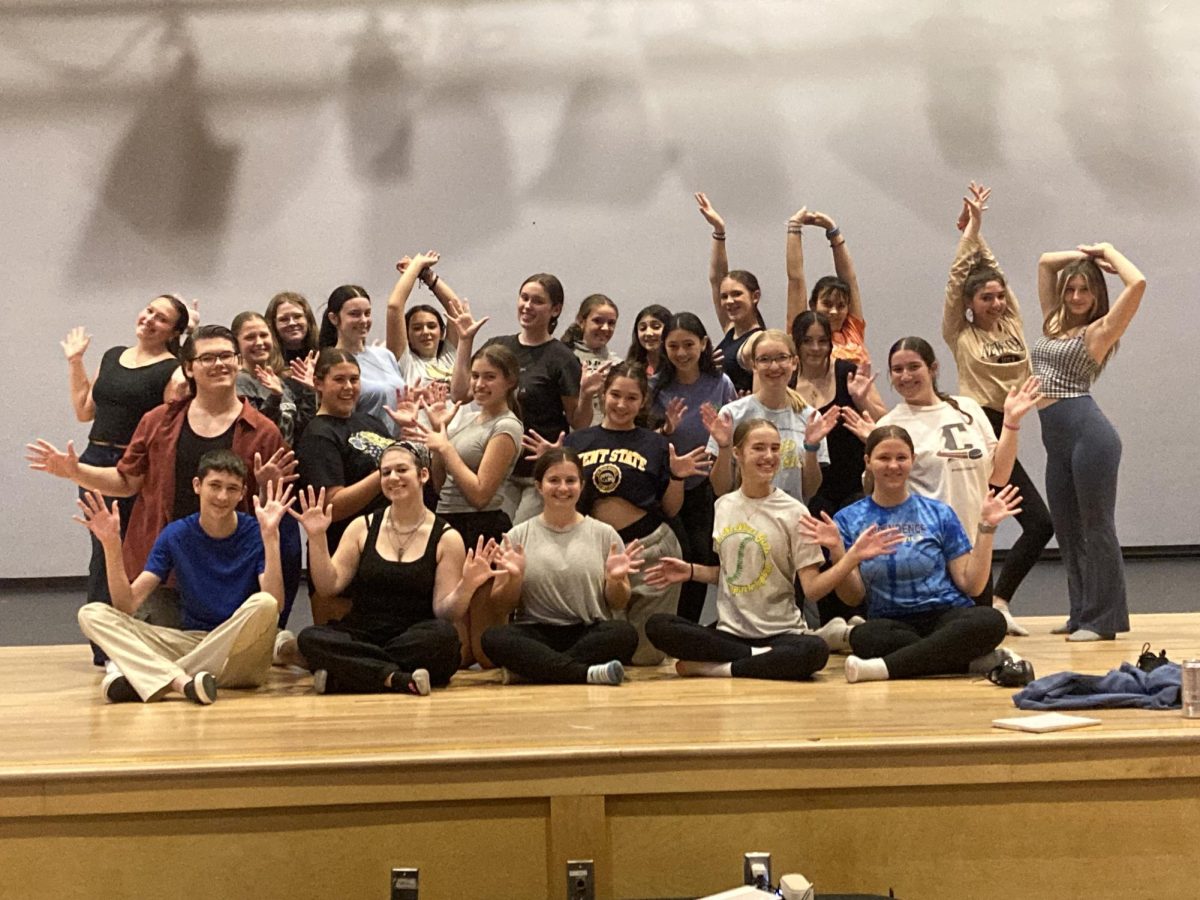 IHS dancers throw out their "jazz hands" in a Fosse-style pose, after learning the techniques used in Chicago, the 2026 Independence High School Spring Musical. 