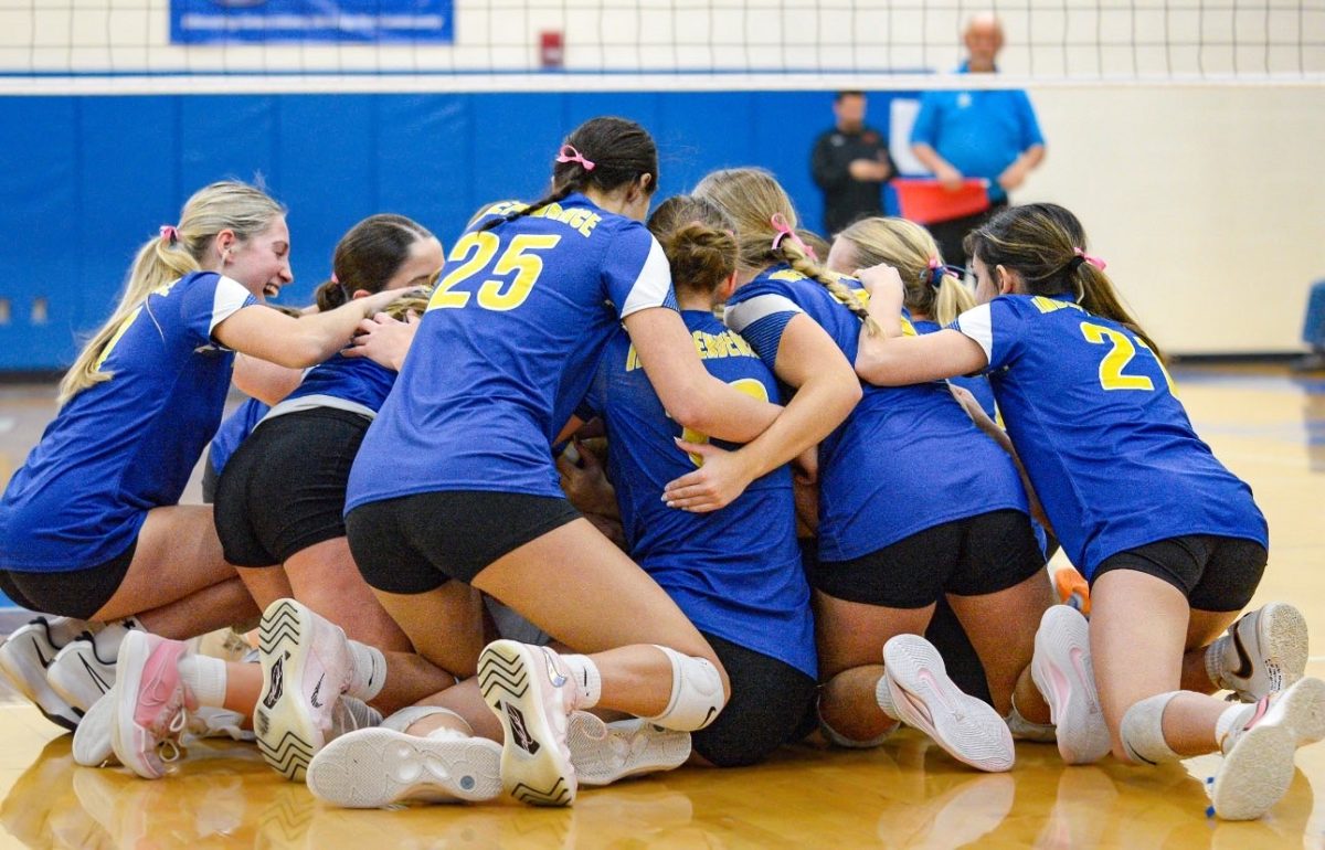 The Devils celebrating after winning Regional Champions against Dalton High School