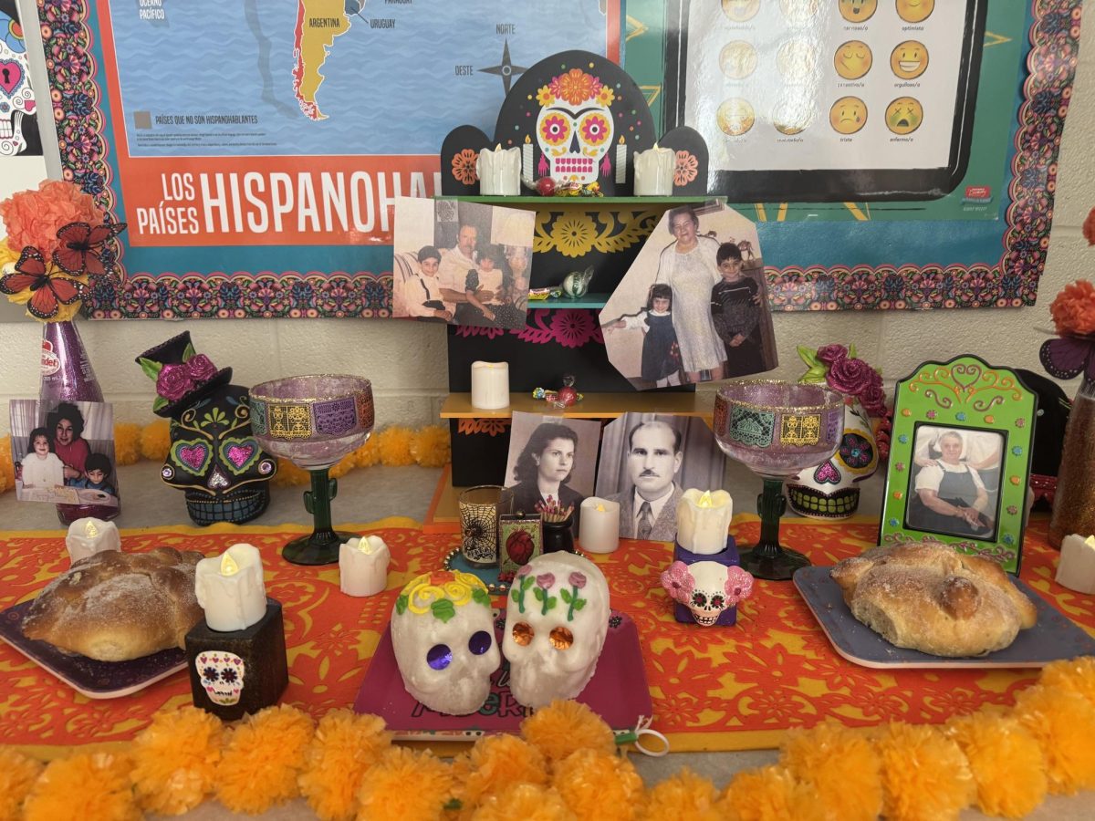 Senora Sanchez shares her beautifully crafted ofrenda. 