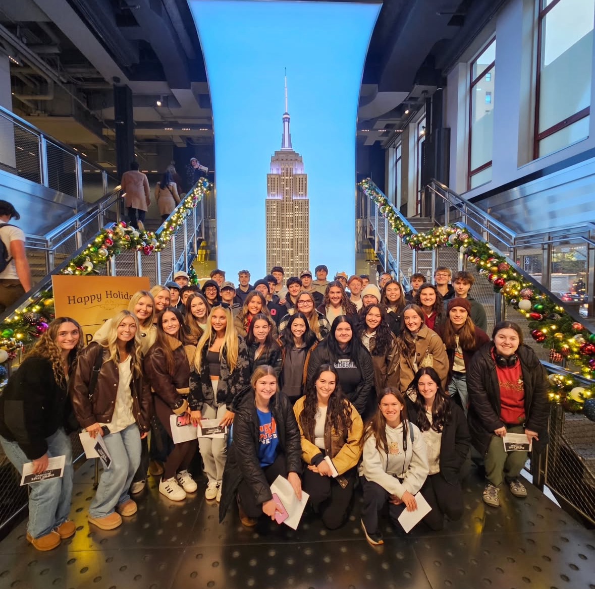 Seniors of the IHS class of 2026 posing inside the Empire State Building.