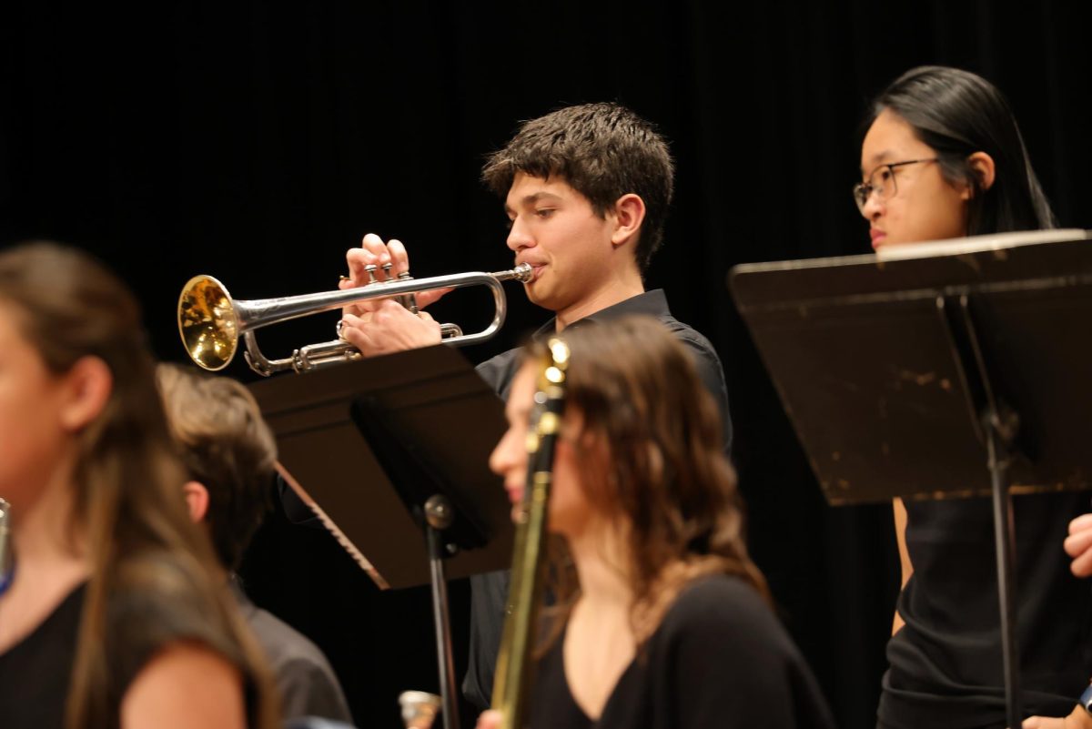 Junior Will Stray performs a trumpet solo at the