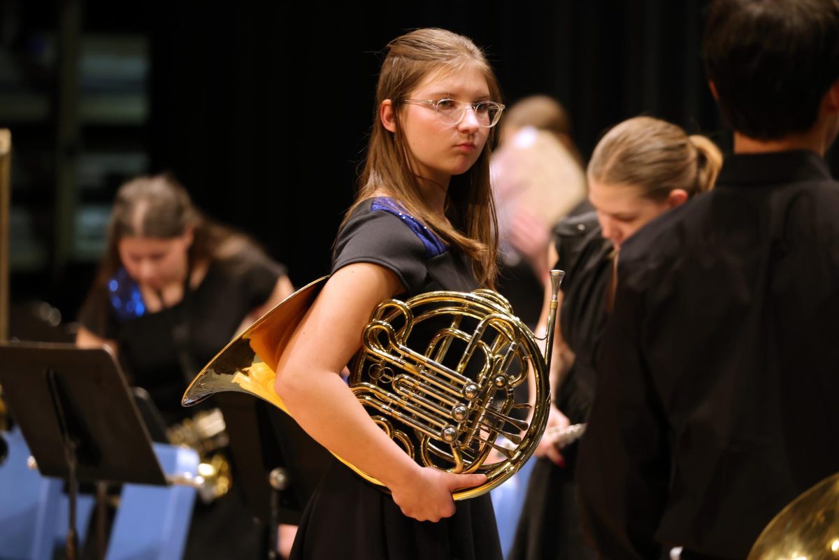 Freshman Jules Churney getting ready for Vocal Ensemble
