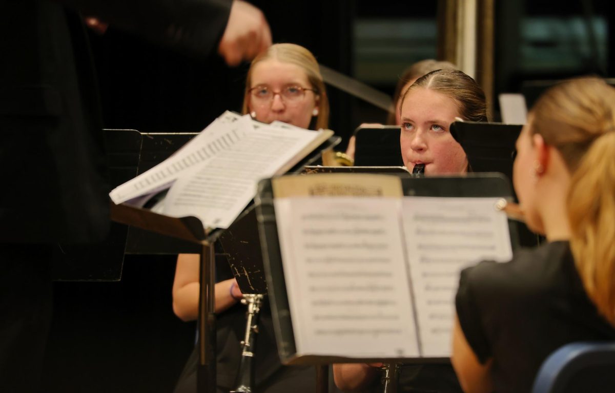 Freshman Emilia Mikolic playing her clarinet for the IHS Wind Ensemble.