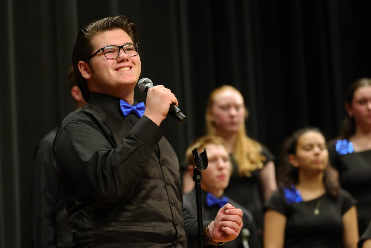 Junior Robby Kalman singing his solo during "Blue Christmas".