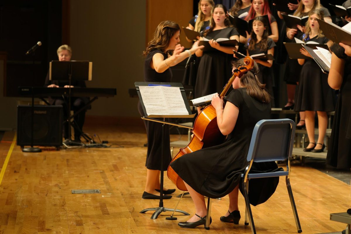 Senior Tillie Averre playing her cello during "O Come, Emanuel"