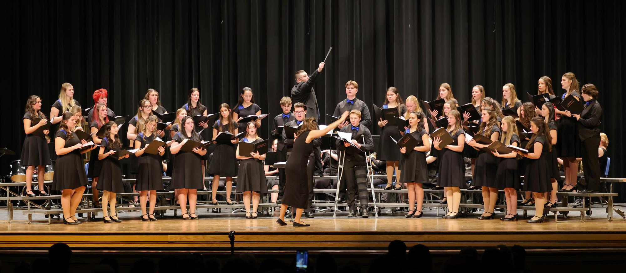 Mr. Michael Greene and Mrs. Gretchen Obrovac co-conducting the joint song "Holiday Favorites"