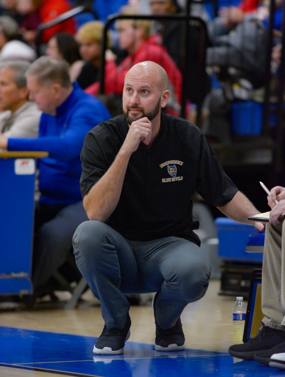Coach Matt Grendell focusing on his team during the Open Door Patriots game.