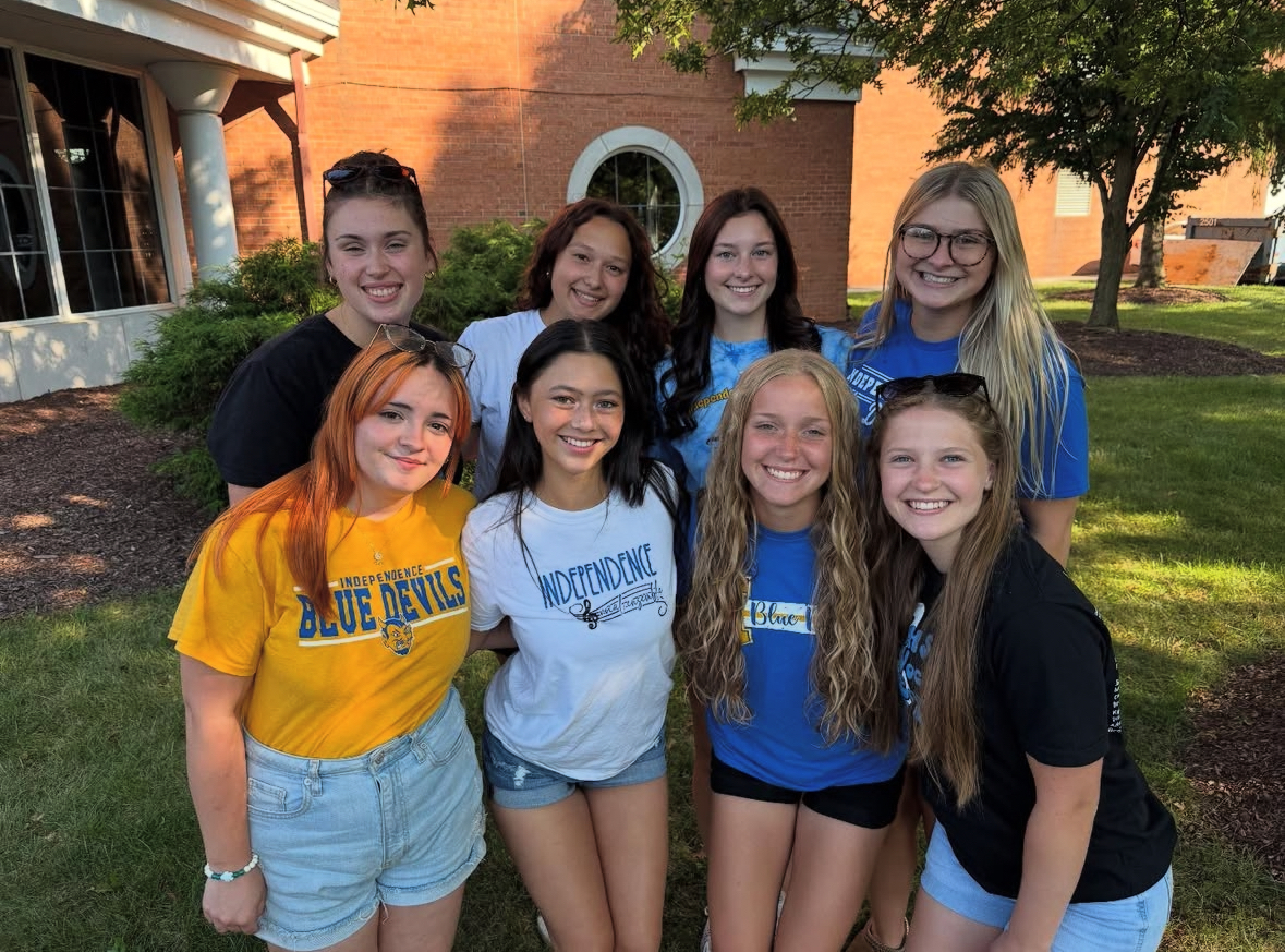 Independence Vocal Ensemble seniors pose before their last first performance singing the National Anthem at the 2026 Independence Homedays.