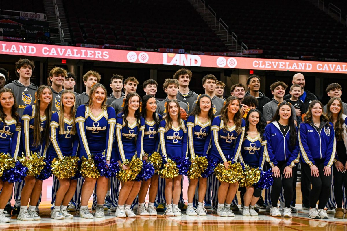Varsity Boys Basketball Team (above)
Varsity Cheerleaders (below)