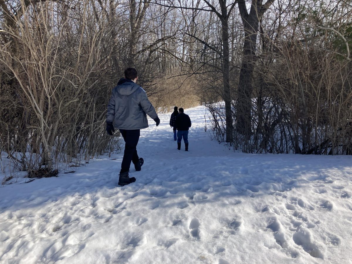 Bio Society members follow Mr. Maretka further into the Land Lab.