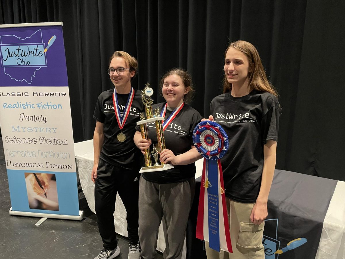 Matthew Liepert, Mes Sheehan, and Tatiana Randjelovic hold awards.