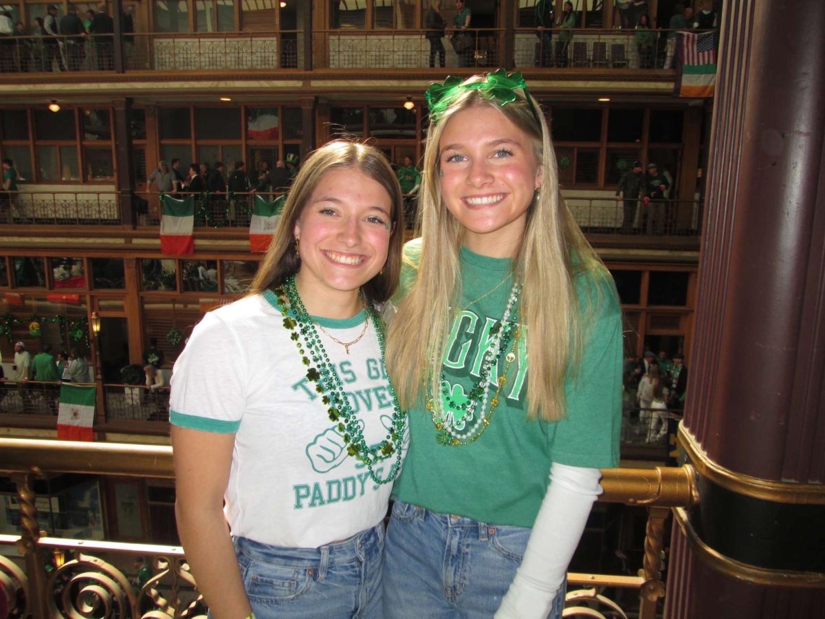 Sisters Keira (IHS '25) and Jamie Donovan are pictured at last year's 2025 St Patrick's Day parade. 