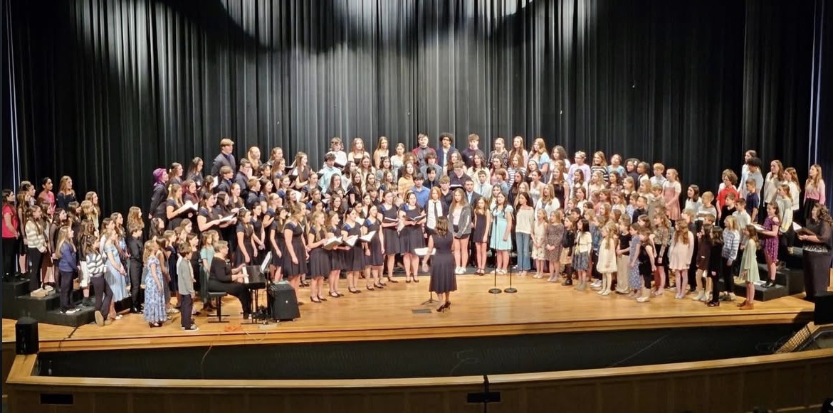 All choirs singing at the district concert.