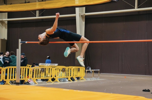 Senior Stephen Mlynarczyk doing the high jump. 