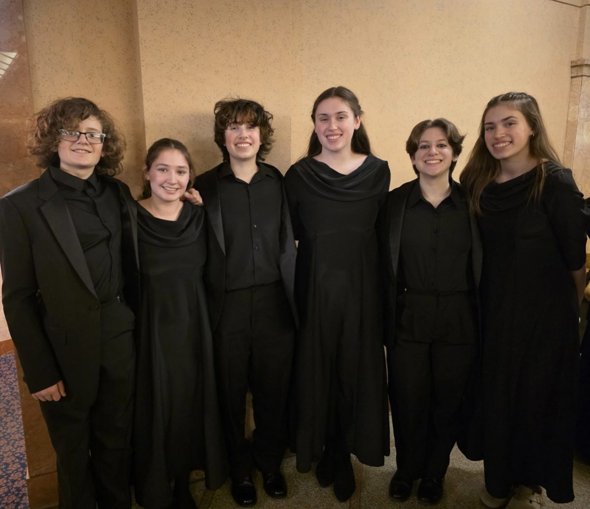 Liam Polter, Sophie Polter, Fred Averre, Tillie Averre, Vinny Carmean, and Penny Averre performed with the Cleveland Orchestra Youth Chorus at Severance Music Center.