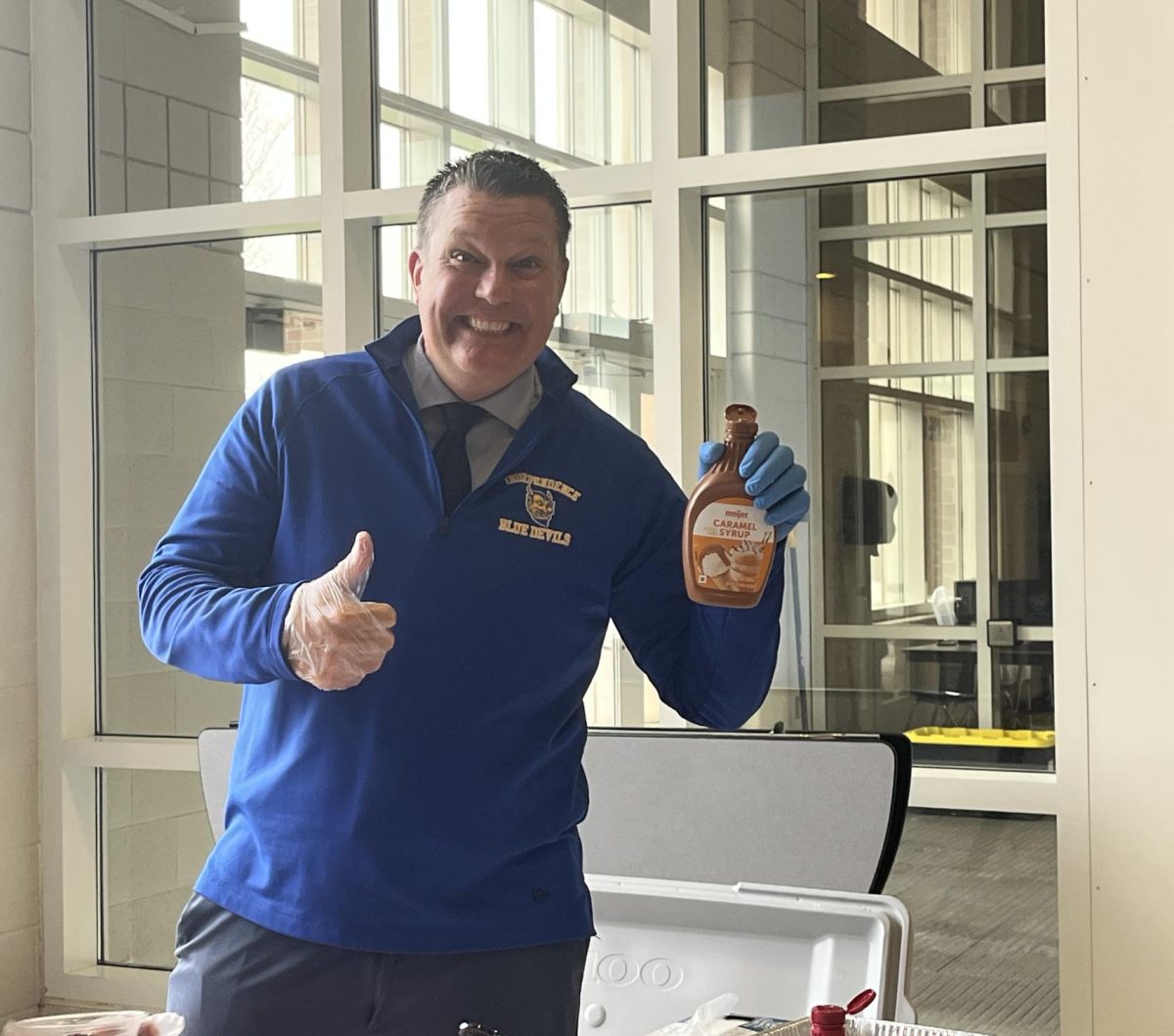 Mr. Mike Janatovich helping run the ice cream social.