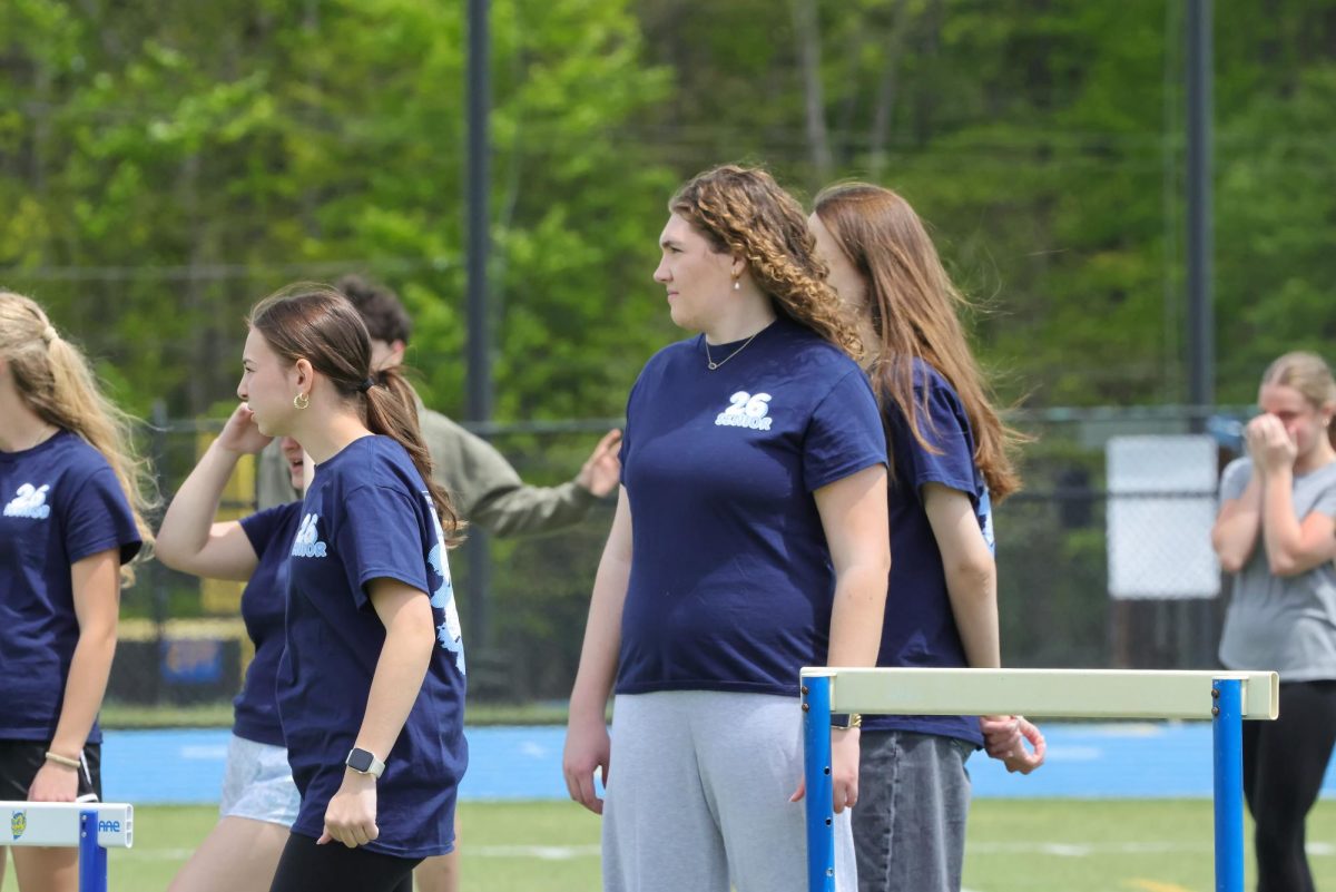 Seniors Gianna Carlucci and Lauren Dalrymple defending the field during the kickball game on seniors' last day of classes. 