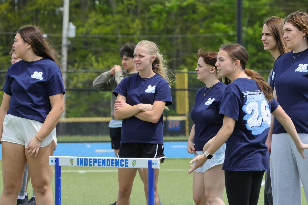 Seniors Addie Kolar, MaryAnne LeRoy, Maddie Kerns, Gianna Carlucci, Tatiana Randjelovic, and Lauren Dalrymple playing outfield during the kickball game on seniors' last day of classes.