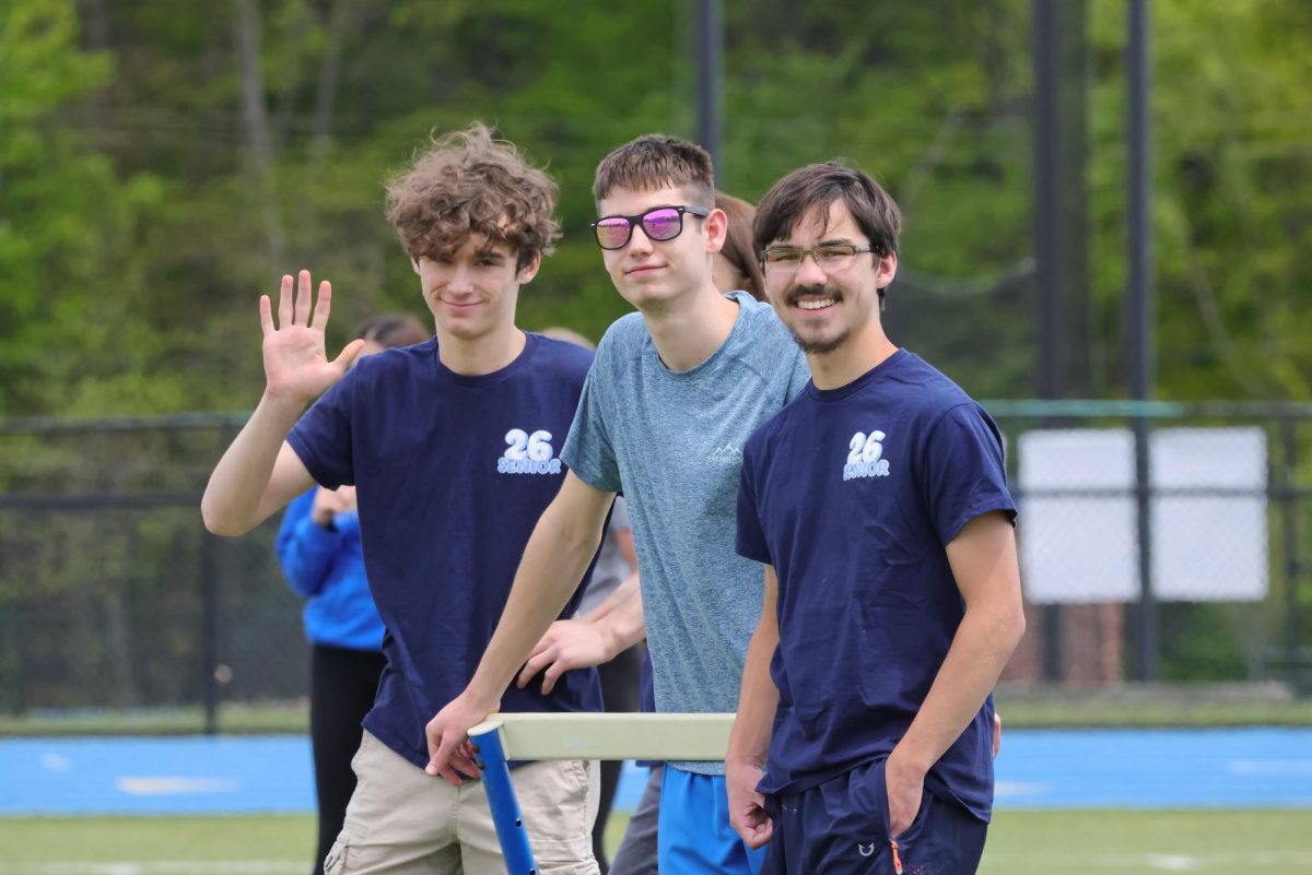 Seniors Matthew Shamblen, Tate McGovern and Nathan Lu at the kickball game on seniors' last day of classes.