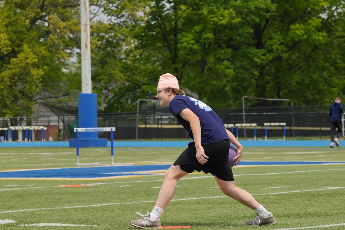 Senior Josh Peters pitches to the opposing team.