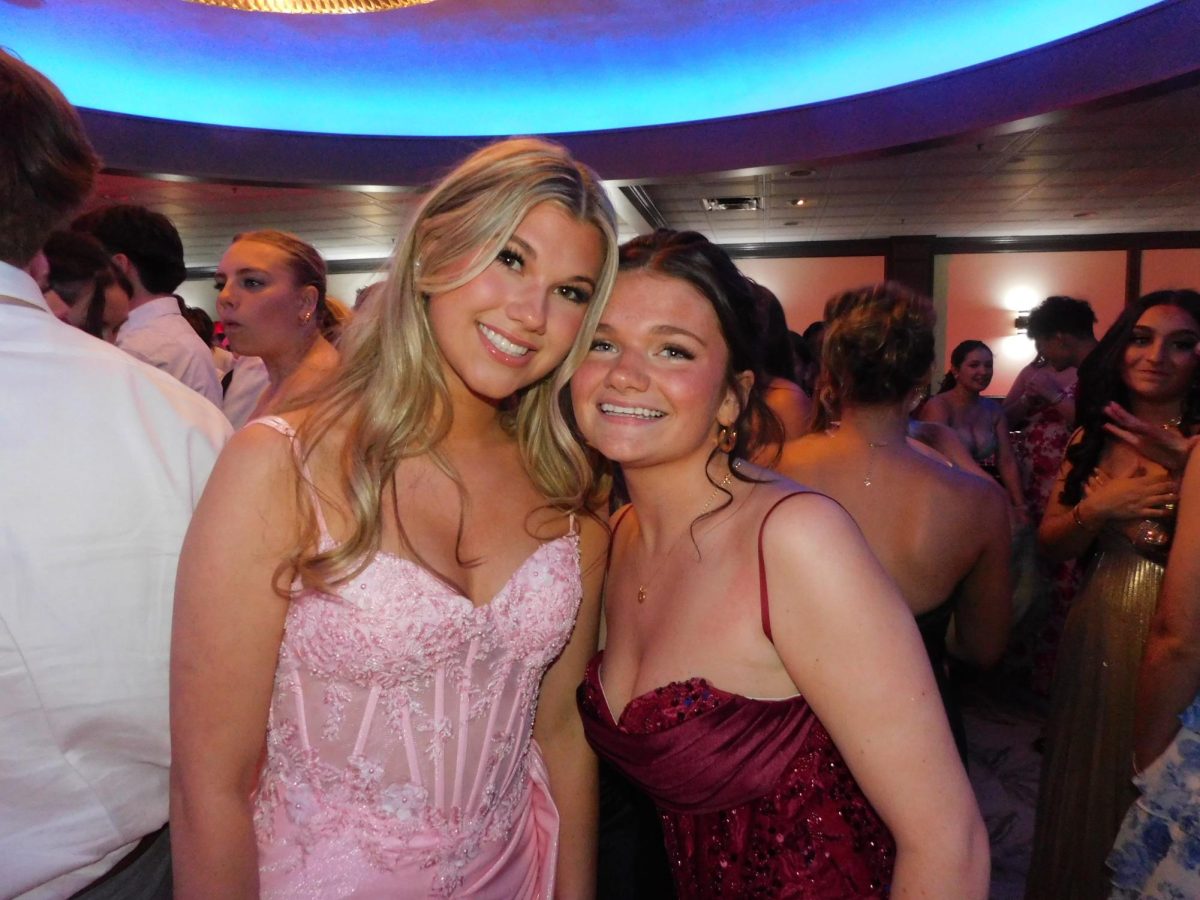 Taylor Prosinski and Melinda Patterson posed together on the dance floor 