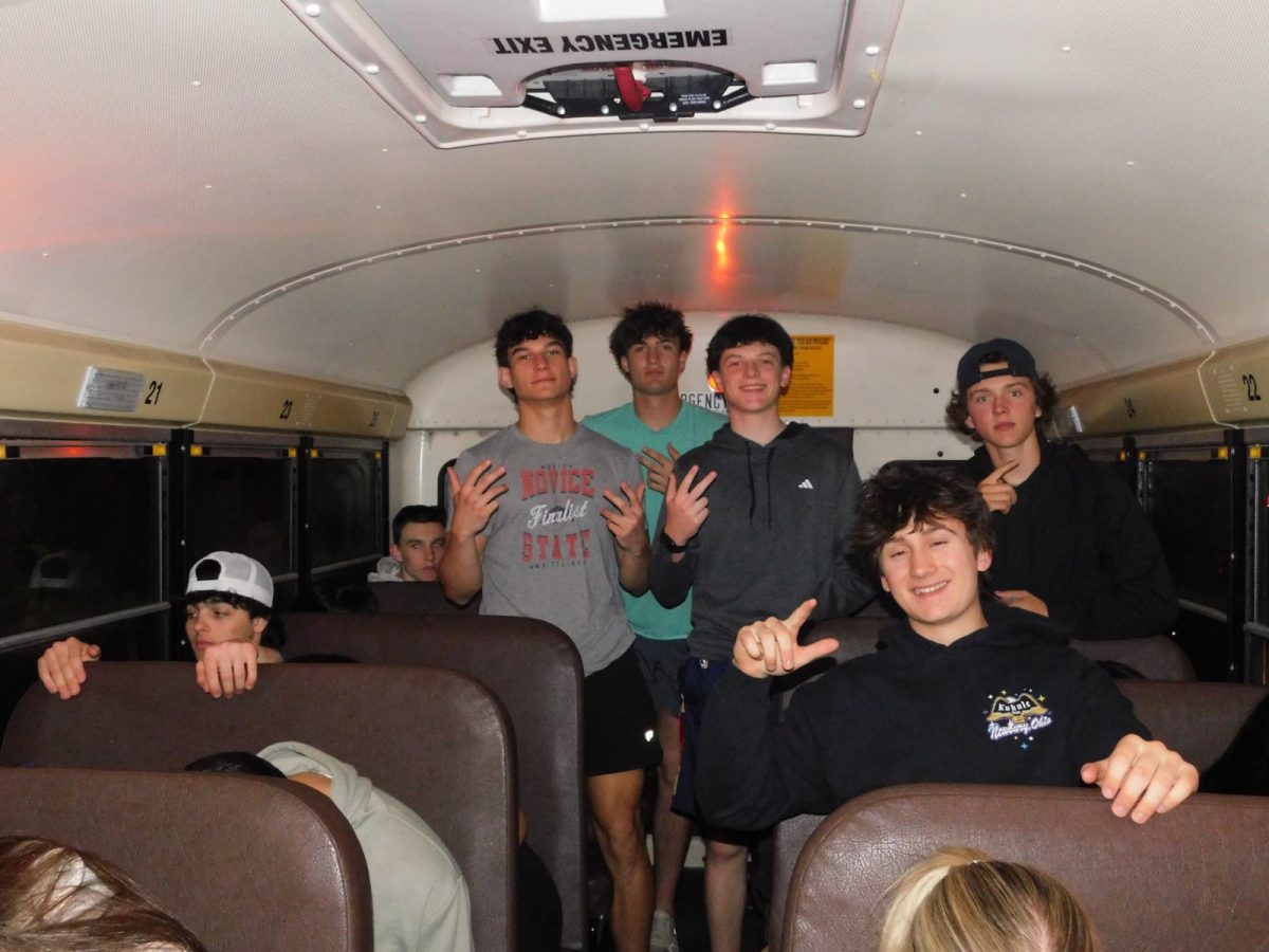 Luke Masek, Anderson Jolliffe, Ryan Suhy, Joshua Gray, and Riley Melbar on the bus to After-Prom at Sky Zone 