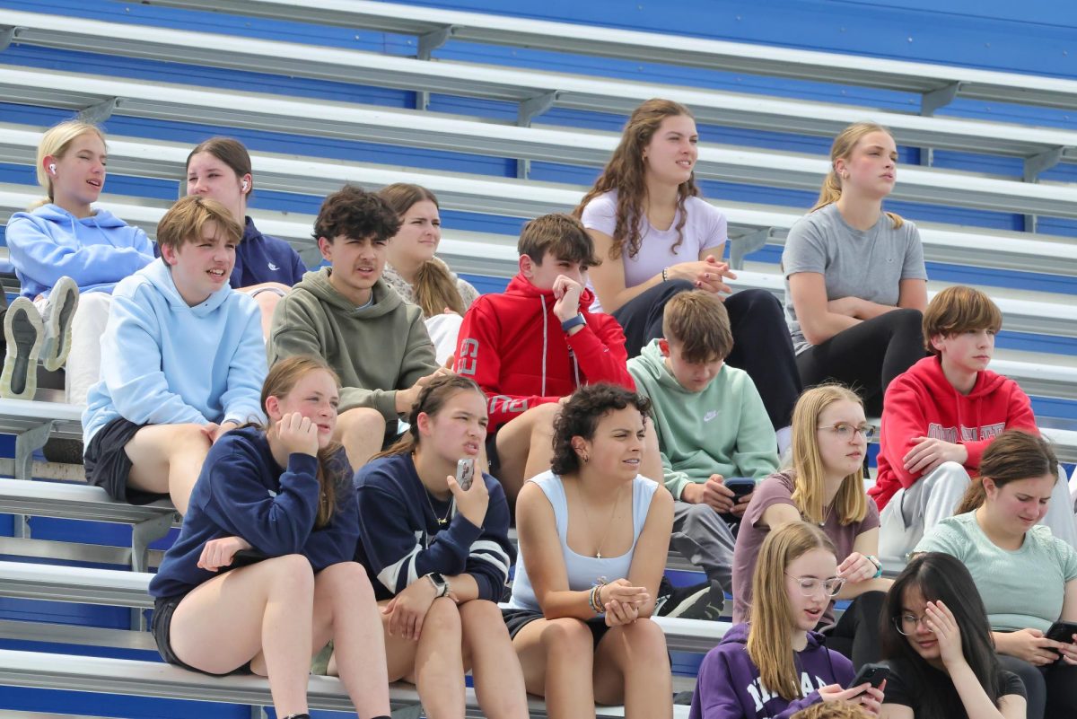 Underclass spectators at the kickball game on the last day of school for seniors.