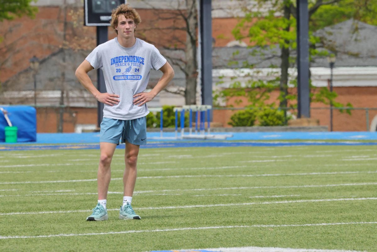 Junior Mitch Meyer defends the field at the kickball game against seniors.