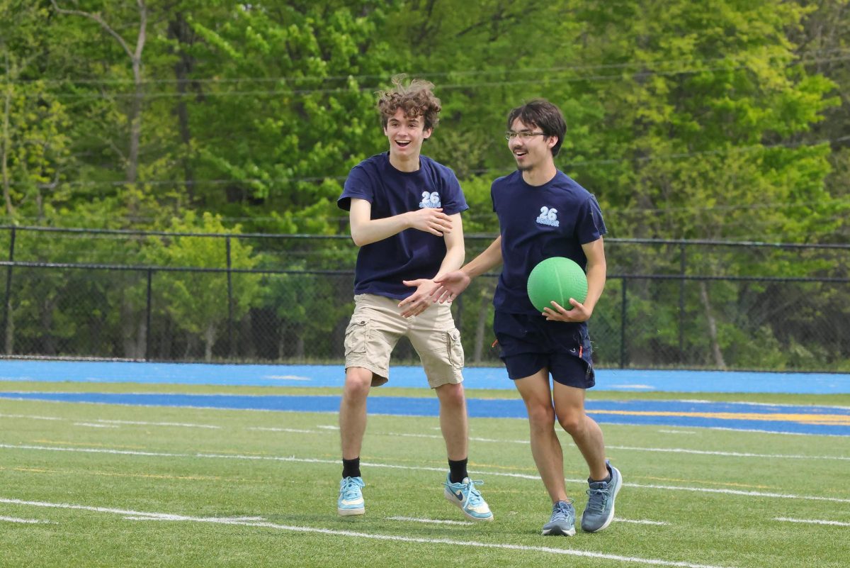 Seniors Matthew Shamblen and Nathan Lu at the kickball game on seniors' last day of classes.