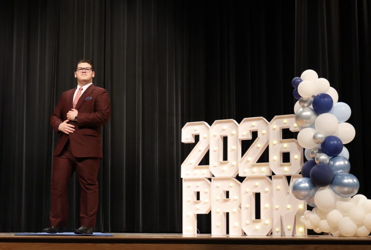 Robert Kalman '27 riding solo down the Blue Carpet  