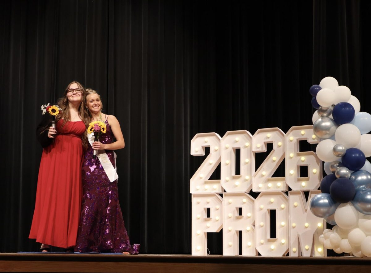 Gabrielle LaRiccia '26 and MaryAnne Leroy '26 walking down the Blue Carpet 