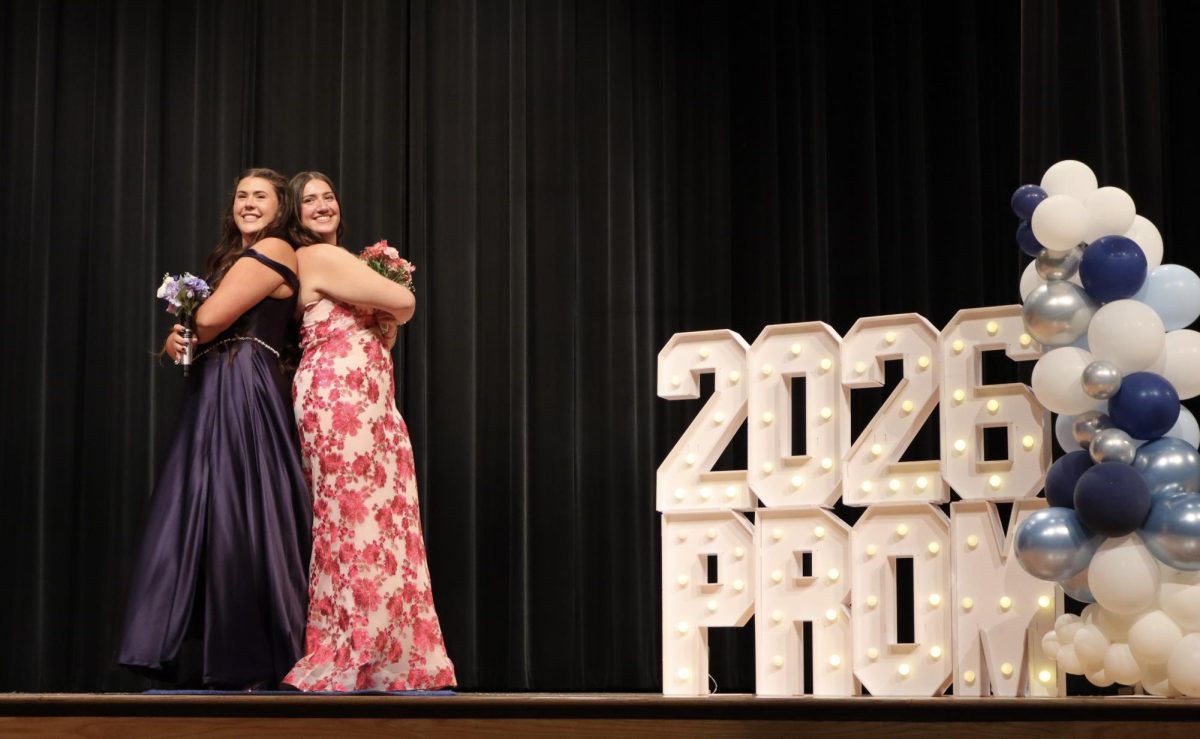 Kylie Hanobik '27 and Mia Percaciante '27 walking down the Blue Carpet 