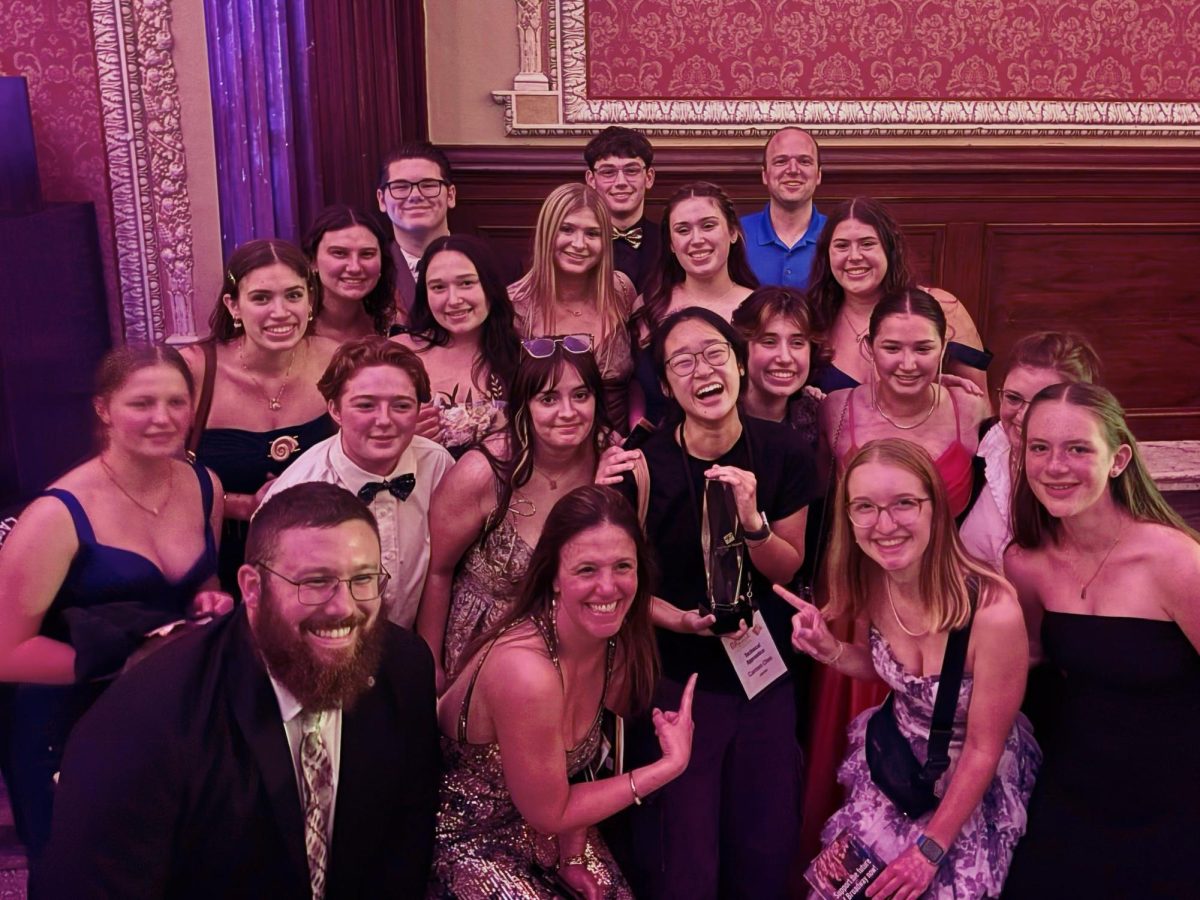 Group gathers at the end of the Dazzle Awards.