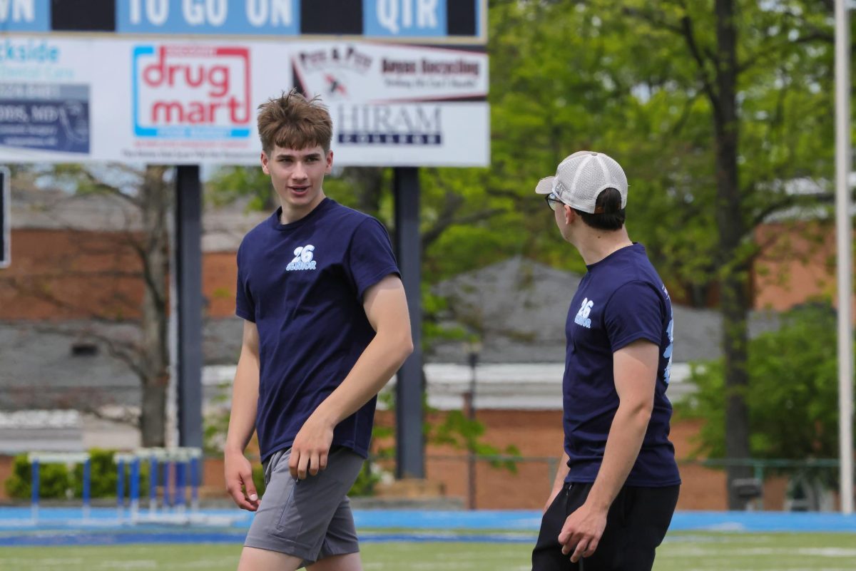 Senior Max Prosinski on the field at the kickball game on seniors' last day.